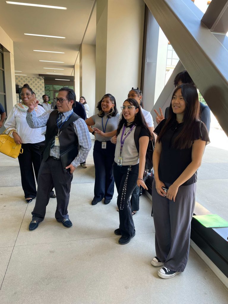 interns waiting outside building to be interviewed by recruiters